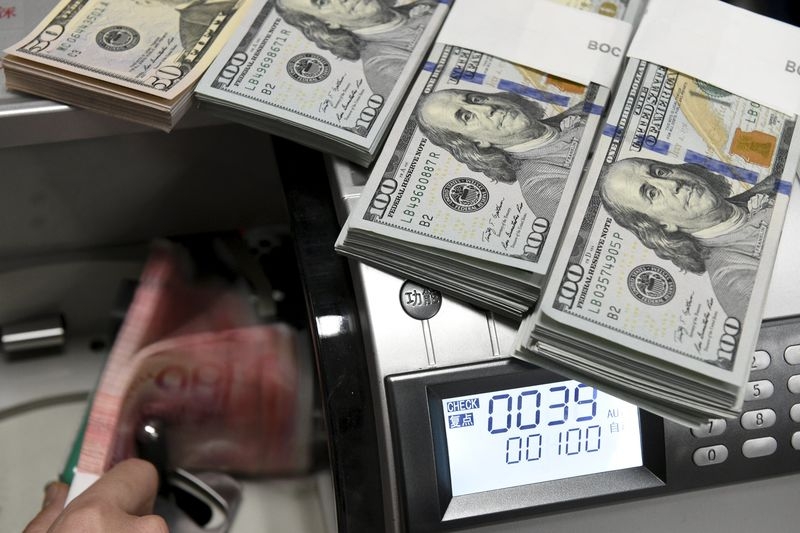 Средний курс доллара США со сроком расчетов "завтра" по итогам торгов составил 74,9518 руб.
